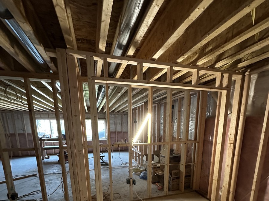 Basement framing in progress on a Stauffer Custom Basements project