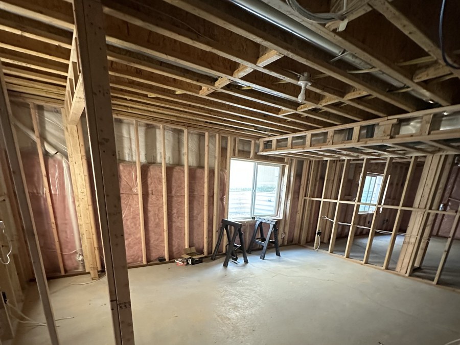 Basement insulation and framing in progress on a Stauffer Custom Basements project